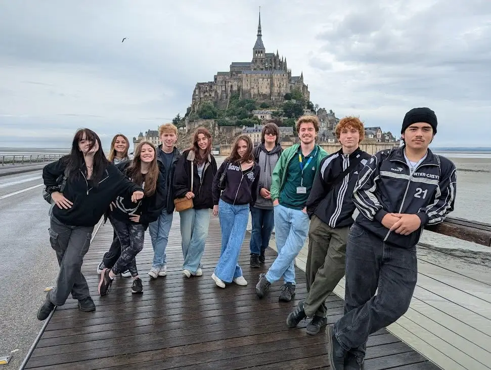 group photo in front of castle